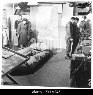 The British Army 'I' Branch operates a mobile information bureau, with interior layout organized by the camouflage branch for operational use. Stock Photo