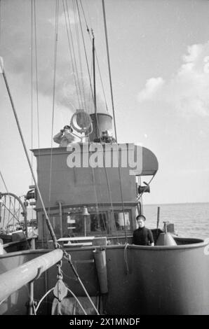 MINESWEEPING. 1940, ON BOARD THE MINESWEEPER, HMT CAYRIAN, SHOWING LIFE ...