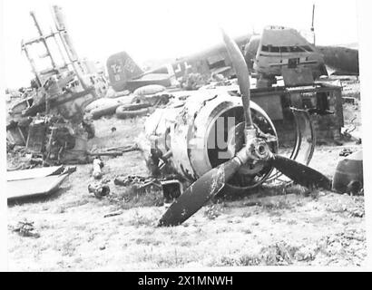 TUNIS AIRPORT : ANOTHER GRAVEYARD OF GOERING'S LUFTWAFFE - Some idea of the vast havoc, showing all types of modern German aircraft, British Army Stock Photo