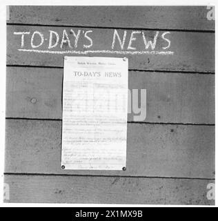 ON BOARD AN AFRICAN BOUND SHIP IN CONVOY - The ship's newspaper, British Army Stock Photo