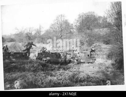 BREN CARRIERS IN ACTION - The crews dash from their vehicles on locating the enemy , British Army Stock Photo