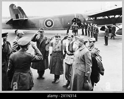 AXIS GENERALS ARRIVE IN SOUTH OF ENGLAND AS PRISONERS OF WAR. - A number of Italian and German generals and high ranking officers arrived by air in the South of England and were taken to a prisoner of war camp. Italian and German officers being received on the airfield on behalf of the War Office by the Director of Prisoners of War. Left to right - Brigadier General Costa; Major General Gepp (back to camera acknowledging salute of enemy officers); Colonel von Hulsen; Brigadier General Mancinelli; Brigadier General Boschi; Brigadier General Aporti and Captain Colombo - ADC. (Picture issued 1943 Stock Photo