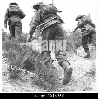 EXERCISES WITH THE FIRST ARMY IN TUNISIA - Mortar carriers travelling ...
