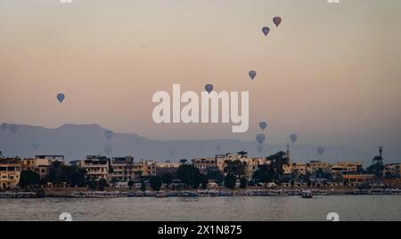 sunrise view from the Nile of hot air balloons over Luxor , Egypt Stock Photo