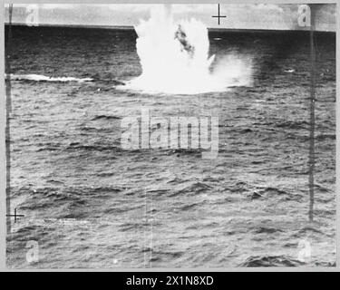 DEFEATING GERMANY'S KEY WEAPON : LIBERATOR v. U-BOAT - 9576 (Picture issued 1943) Attack on a U-boat. Depth charges exploding after a U-boat has been sighted, Royal Air Force Stock Photo