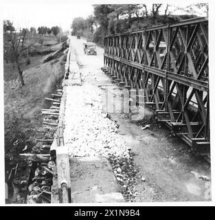 ITALY : AUTUMN FLOODS CAUSE ROAD DAMAGE - As above, view on upstream side showing new stone packing replacing earth filling. The water did not bank up to road level and flow over on this site, British Army Stock Photo