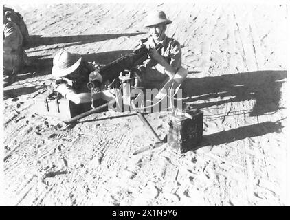 Sudan Auxiliary Force personnel learn the components and operation of the Vickers machine gun during British Army training. Stock Photo