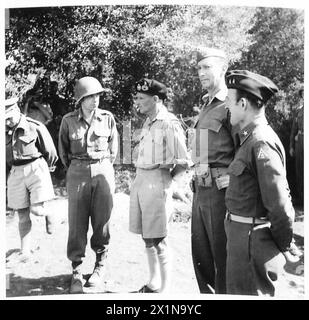 GENERAL MONTGOMERY AT SALERNO - General Montgomery talks to an American officer during his tour; he is seen with General Mark Clark, British Army Stock Photo