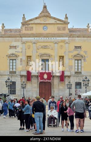 Tarragona, Spain - April 17, 2024: Detailed view of Tarragona town hall, showing its classical architecture, sculptures and a clock on top. Stock Photo