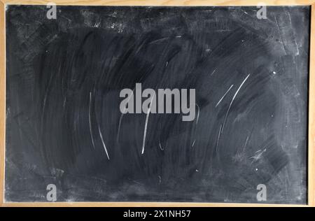 Chalk rubbed out on blackboard background Stock Photo