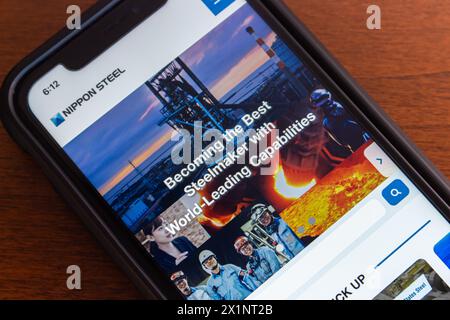 Website of Nippon Steel seen in an iPhone. Nippon Steel Corporation is Japan's largest steelmaker, headquartered in Chiyoda-ku, Tokyo Stock Photo