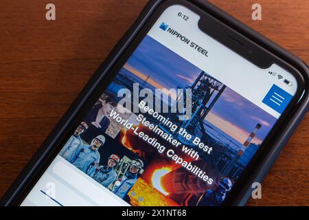Website of Nippon Steel seen in an iPhone. Nippon Steel Corporation is Japan's largest steelmaker, headquartered in Chiyoda-ku, Tokyo Stock Photo
