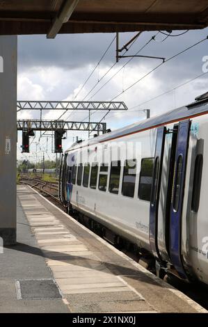 Norther trains class 158 express sprinter diesel multiple-unit in platform 1 at Carnforth railway station on 17th April 2024. Stock Photo