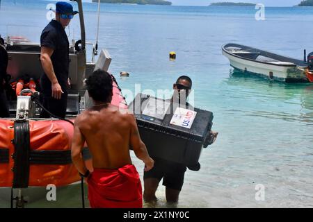 Woleai, Micronesia, Federated States Of. 12 April, 2024. The crew of the Sentinel-class fast response cutter USCGC Oliver Henry and local residents unload fresh water and a reverse osmosis system to relieve the shortage of drinking water from drought on the remote island, April 12, 2024 in Woleai, Yap State, Federated States of Micronesia. Credit: CWO Sara Muir/USCG/Alamy Live News Stock Photo