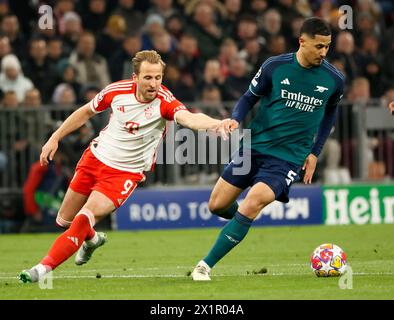 Munich, Germany. 17th Apr, 2024. Harry Kane (L) of Bayern Munich vies with William Saliba of Arsenal during the UEFA Champions League quarterfinal 2nd Leg football match between Bayern Munich and Arsenal in Munich, Germany, April 17, 2024. Credit: Philippe Ruiz/Xinhua/Alamy Live News Stock Photo