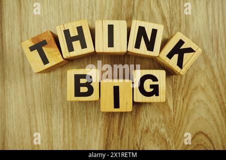 think big word made from wooden cubes with letters alphabet Stock Photo