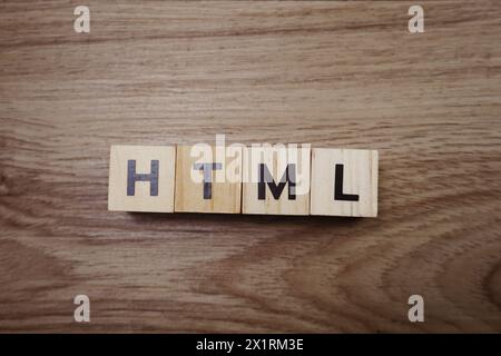 HTML word letter on wooden background Stock Photo