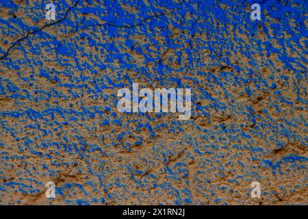 Blue and beige colored abstract wall background with textures of different shades of blue Stock Photo