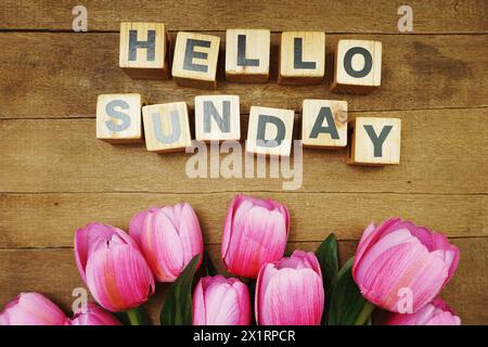 Hello Sunday alphabet letters on blue background Stock Photo - Alamy