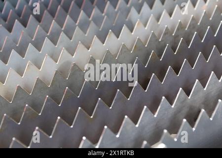 Metal elements in the form of triangles close-up. Backgrounds and textures Stock Photo
