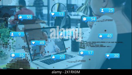 Caucasian male colleague wearing white shirt is working on a laptop Stock Photo
