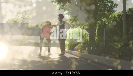African American fitness instructor couple are training outdoors Stock Photo