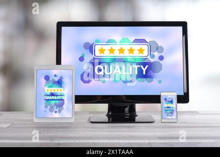 Quality concept shown on different information technology devices Stock Photo