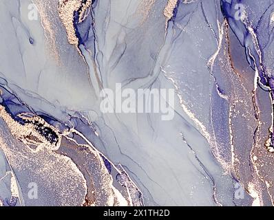 Abstract alcohol ink liquid luxury glittering contemporary background. Purple and golden color fluid stains, splashes pattern. Marble effect texture. Stock Photo