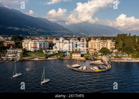 Ascona, Switzerland: Aerial view of Ascona waterfont by lake Maggiore with a small marina  and sailboat in canton Ticino in Switzerland Stock Photo