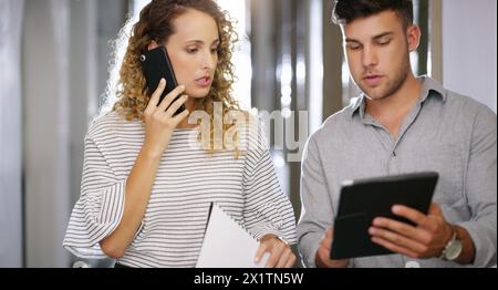 Busy, collaboration and technology with business people in office together for project multitasking. Phone call, internet and teamwork with colleague Stock Photo