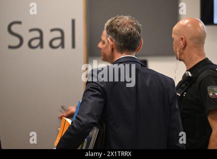 18 April 2024, Saxony-Anhalt, Halle (saale): Björn Höcke (v), chairman of the Thuringian AfD, leaves the courtroom at the end of the trial day in Halle district court. He is accused of using the symbols of unconstitutional and terrorist organizations. Photo: Hendrik Schmidt/dpa Stock Photo