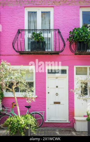 Pink house in St Luke Mews, Notting Hill, London UK Stock Photo