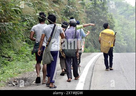 Guwahati, Guwahati, India. 18th Apr, 2024. Residents of Meghalaya on thier way for work at Umling in Re Bhoi district of Meghlaya India on the eve of 1st phase of Lok Sabha Election 2024 on Thursday 18th April 2024 (Credit Image: © Dasarath Deka/ZUMA Press Wire) EDITORIAL USAGE ONLY! Not for Commercial USAGE! Stock Photo