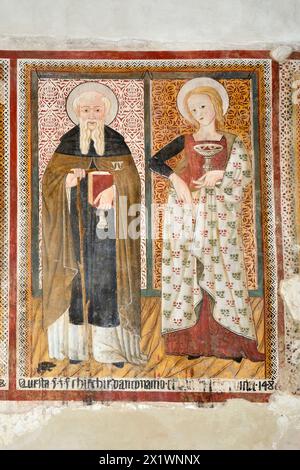 Sant'antonio Abate and Santa Lucia. 15th Century Umbrian School Fresco Cycle. Church of San Giovanni Battista. Arrone. Valnerina. Umbria. Italy Stock Photo