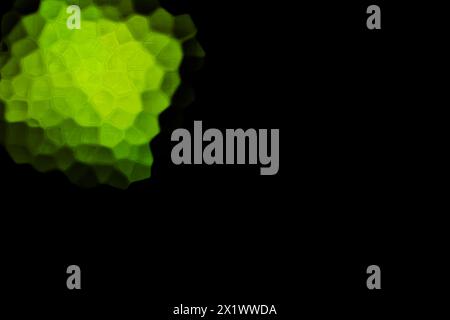 Green Polygonal Shapes on black background. Honeycomb pattern. Stock Photo