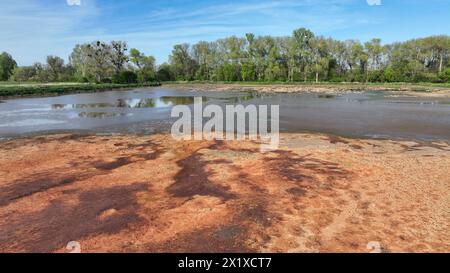 Dump toxic waste aerial drone factory sugarcane manufacturing mill sugar beet water former lagoon, plant effects nature from soil contaminated Stock Photo