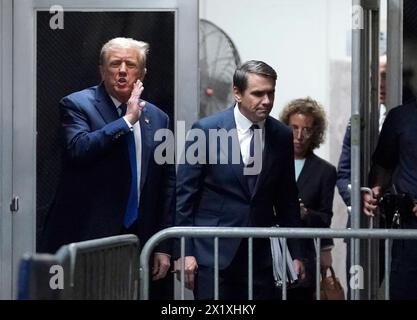 Former US President Donald Trump (L), with his attorney Todd Blanche (C), returns from lunch break as he attends his trial for allegedly covering up hush money payments linked to extramarital affairs, at Manhattan Criminal Court in New York City on Thursday, April 18, 2024. Trump's criminal trial resumes Thursday with Judge Juan Merchan seeking to complete jury selection. Moving the US into uncharted waters, it is the first criminal trial of a former US president, one who is also battling to retake the White House in November. Pool Photo by Timothy A. Clary/UPI Stock Photo