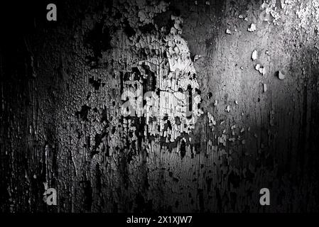 Texture of rusty metal in black color with a gradient. Abstract dark metal background with side light Stock Photo