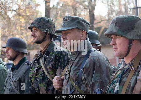 Vorzel, Ukraine - November 03, 2019: Men in the form of Wehrmacht soldiers at the festival of historical reconstruction Stock Photo