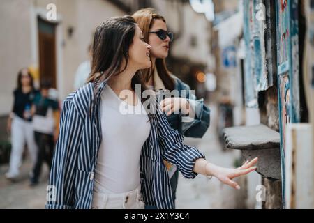 Young friends exploring a sunny city, sightseeing and enjoying a relaxed vacation together Stock Photo