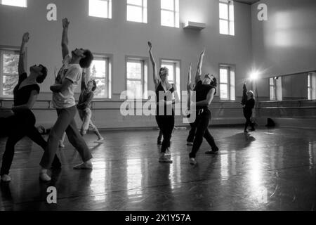 A vintage-style photograph capturing a practice session of the Alberta Ballet Company in Calgary, Alberta, from the year 1990. Stock Photo