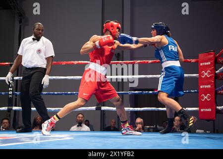 Pueblo, Colorado, USA. 18th Apr, 2024. Emilie Sonvico of France(Blue) trades punches with Stacia Suttles of the United States(Red), before winning their women's second round 66 kg match. Credit: Casey B. Gibson/Alamy Live News Stock Photo