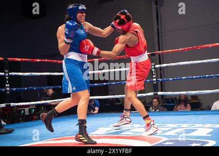 Pueblo, Colorado, USA. 18th Apr, 2024. Emilie Sonvico of France(Blue) trades punches with Stacia Suttles of the United States(Red), before winning their women's second round 66 kg match. Credit: Casey B. Gibson/Alamy Live News Stock Photo