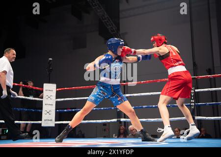 Pueblo, Colorado, USA. 18th Apr, 2024. Stefanie von Berge of Germany(Red) trades punches with Marissa Williamson of Australia(Blue) before winning their second round women's 66 kg match. Credit: Casey B. Gibson/Alamy Live News Stock Photo