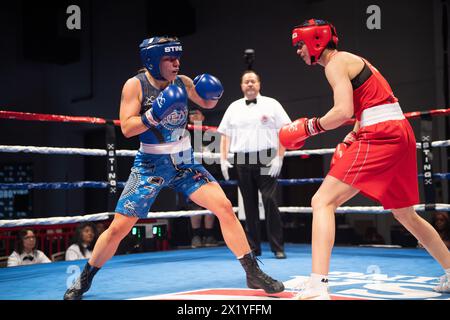 Pueblo, Colorado, USA. 18th Apr, 2024. Stefanie von Berge of Germany(Red) trades punches with Marissa Williamson of Australia(Blue) before winning their second round women's 66 kg match. Credit: Casey B. Gibson/Alamy Live News Stock Photo