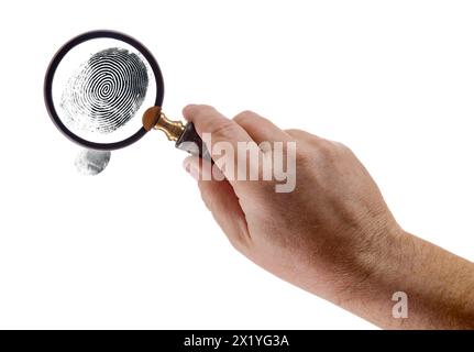 Male Hand Holding Magnifying Glass Viewing A Fingerprint on a White Background. Stock Photo