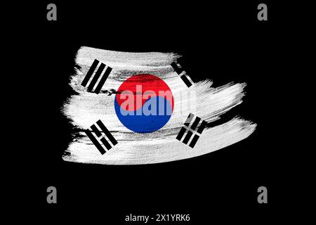 creative national grunge flag, brushstroke South Korea flag on black isolated background, concept of politics, global business, international cooperat Stock Photo