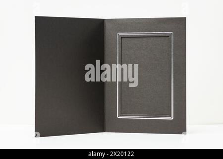 Cardboard photo photography black sleeve pocket folder frame personal display decorative for showcasing and protecting prints Stock Photo