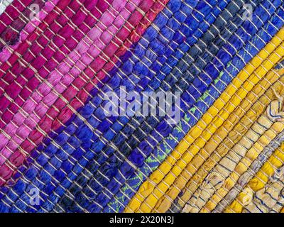 Detail of the stitched fabric on a colorful rag rug Stock Photo