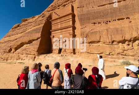 Al Ula, Saudi Arabia - February 05 2023: Tourists visit the famous tombs of the Nabatean civilization, Al-Ula being their second largest city after Pe Stock Photo